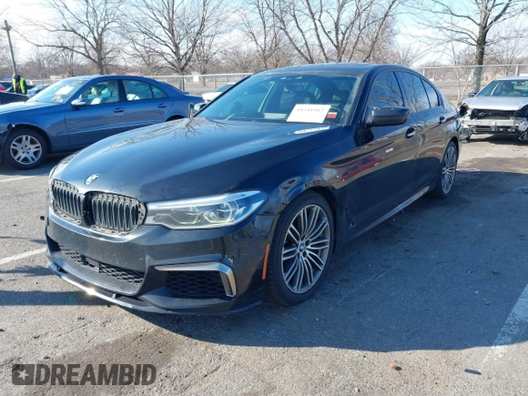 2018 BMW 5 Series M550i xDrive with VIN WBAJB9C55JB049529, listed as a IAAI auction lot 41241917 with 116,265 mi miles and . Bid and sale history available at carsss.com. Image 6.