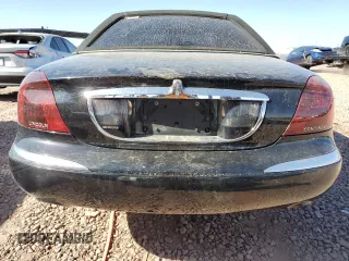 2001 Lincoln Continental with VIN 1LNHM97V61Y604213, listed as a Copart auction lot 52517535 with 112,391 mi miles and Salvage Title. Bid and sale history available at DreamBid. Image 6.