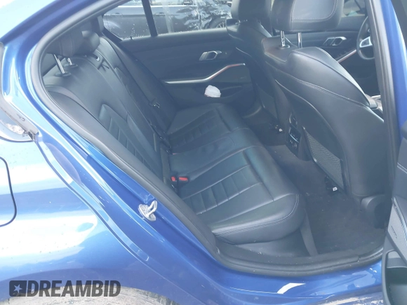 2020 BMW 3 Series M340i xDrive with VIN WBA5U9C00LFH03223, listed as a IAAI auction lot 41020498 with 58,775 mi miles and . Bid and sale history available at DreamBid. Image 8.
