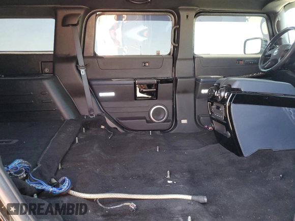 2005 Hummer H2 SUV z VIN 5GRGN23U05H117630, wystawiony jako Copart lot #57087305 z przebiegiem 60 260 mil mil oraz Szkoda całkowita • Salvage title. Historia ofert i sprzedaży dostępna na DreamBid. Obrazek 10.