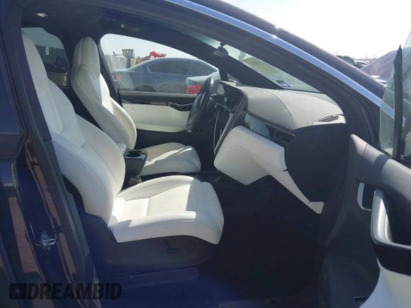 2019 Tesla Model X 75D with VIN 5YJXCBE22KF184504, listed as a IAAI auction lot 41802023 with 137,094 mi miles. Bid and sale history available at carsss.com. Image 5.