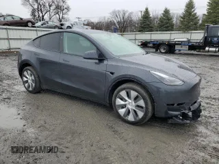2024 Tesla Model Y Long Range with VIN 7SAYGDEE6RA278636, listed as a Copart auction lot 48718085 with 21,349 mi miles and Salvage Title. Bid and sale history available at DreamBid. Image 4.