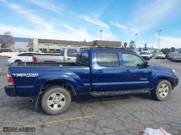 2015 Toyota Tacoma with VIN 3TMMU4FN0FM077148, listed as a IAAI auction lot 41274934 with 112,617 mi miles. Bid and sale history available at carsss.com. Image 14.