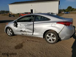 2013 Hyundai Elantra Coupe GS PZEV with VIN KMHDH6AE3DU009633, listed as a Copart auction lot 71776734 with 36,744 mi miles and Clean Title. Bid and sale history available at carsss.com. Image 2.