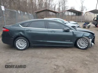 2015 Ford Fusion SE Hybrid with VIN 3FA6P0LU0FR242452, listed as a IAAI auction lot 41790218 with 163,741 mi miles. Bid and sale history available at carsss.com. Image 13.