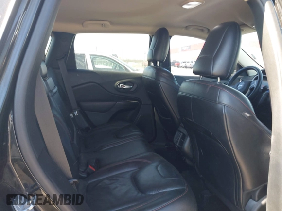 2015 Jeep Cherokee Trailhawk with VIN 1C4PJMBS5FW577470, listed as a IAAI auction lot 41565837 with 191,105 mi miles. Bid and sale history available at carsss.com. Image 8.