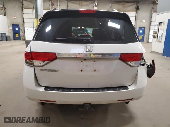 2016 Honda Odyssey EX-L with VIN 5FNRL5H67GB090747, listed as a Copart auction lot 53957235 with 131,464 mi miles and Salvage Title. Bid and sale history available at DreamBid. Image 6.