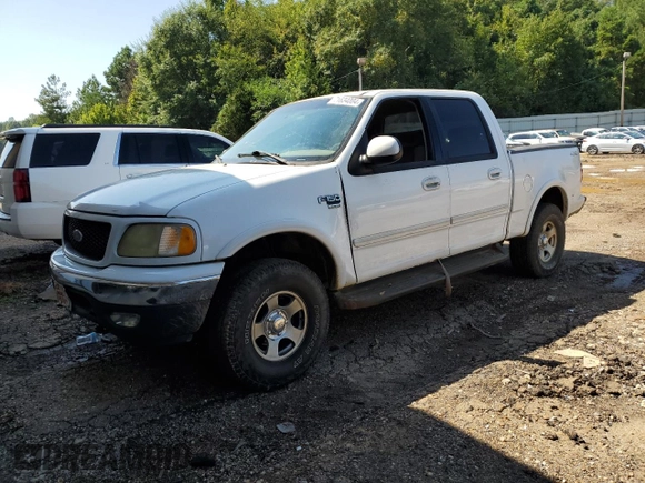 2003 Ford F-150 XLT with VIN 1FTRW08L23KD65857, listed as a Copart auction lot 71634004 with 321,505 mi miles and Clean Title. Bid and sale history available at carsss.com. Image 1.