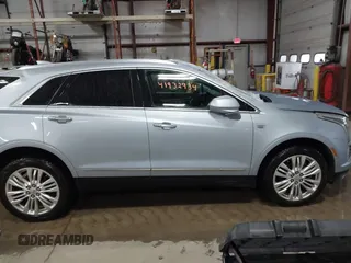 2017 Cadillac XT5 Premium Luxury AWD z VIN 1GYKNERS4HZ306955, wystawiony jako IAAI lot #41932934 z przebiegiem 150 050 mil mil oraz . Historia ofert i sprzedaży dostępna na DreamBid. Obrazek 13.