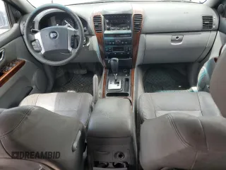 2006 Kia Sorento LX z VIN KNDJD733265572903, wystawiony jako Copart lot #56123945 z przebiegiem 185 664 mil mil oraz Szkoda całkowita • Salvage title. Historia ofert i sprzedaży dostępna na DreamBid. Obrazek 8.