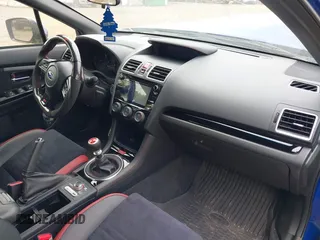 2020 Subaru WRX STI with VIN JF1VA2E61L9833954, listed as a IAAI auction lot 42336349 with 58,668 mi miles and . Bid and sale history available at DreamBid. Image 5.