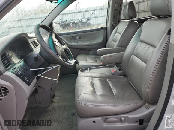 2002 Honda Odyssey EX z VIN 2HKRL18692H578746, wystawiony jako Copart lot #51281845 z przebiegiem 282 844 mil mil oraz Szkoda całkowita • Salvage title. Historia ofert i sprzedaży dostępna na DreamBid. Obrazek 7.