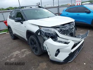 2021 Toyota RAV4 Hybrid XSE with VIN JTME6RFV5MJ011927, listed as a IAAI auction lot 42146436 with 50,614 mi miles and . Bid and sale history available at DreamBid. Image 1.