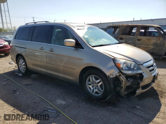 2006 Honda Odyssey EX-L z VIN 5FNRL38726B425098, wystawiony jako Copart lot #56143585 z przebiegiem 153 137 mil mil oraz Szkoda całkowita • Salvage title. Historia ofert i sprzedaży dostępna na DreamBid. Obrazek 4.