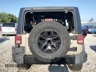 2018 Jeep Wrangler JK Unlimited Sport S with VIN 1C4BJWDG0JL912451, listed as a Copart auction lot 68477194 with 0 mi miles and Non Repairable. Bid and sale history available at carsss.com. Image 6.
