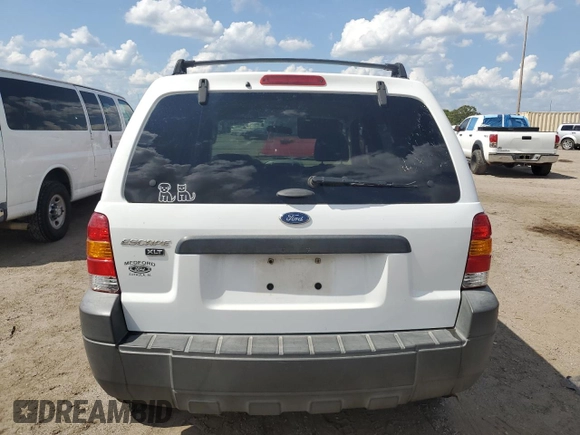 2005 Ford Escape XLT z VIN 1FMYU93145DA04306, wystawiony jako Copart lot #56209425 z przebiegiem 124 956 mil mil oraz Szkoda całkowita • Salvage title. Historia ofert i sprzedaży dostępna na DreamBid. Obrazek 6.