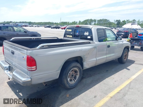 1999 Dodge Dakota SLT z VIN 1B7GL22X9XS258964, wystawiony jako IAAI lot #42309862 z przebiegiem 177 561 mil mil oraz . Historia ofert i sprzedaży dostępna na DreamBid. Obrazek 4.
