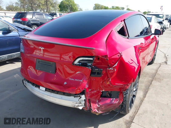 2022 Tesla Model Y Performance z VIN 7SAYGDEF0NF518740, wystawiony jako IAAI lot #41785358 z przebiegiem 50 692 mil mil oraz . Historia ofert i sprzedaży dostępna na DreamBid. Obrazek 4.