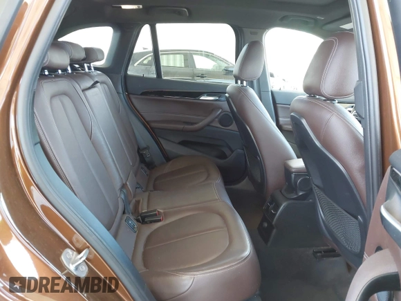 2017 BMW X1 xDrive28i with VIN WBXHT3C34H5F75885, listed as a IAAI auction lot 42655580 with 54,609 mi miles and . Bid and sale history available at DreamBid. Image 8.