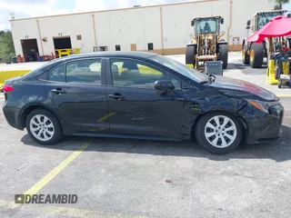 2023 Toyota Corolla LE with VIN JTDB4MEE2PJ004869, listed as a IAAI auction lot 42139964 with 41,119 mi miles. Bid and sale history available at carsss.com. Image 13.