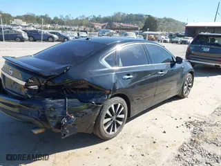 2016 Nissan Altima 2.5 S with VIN 1N4AL3AP8GC211311, listed as a IAAI auction lot 40564649 with 212,660 mi miles. Bid and sale history available at carsss.com. Image 4.