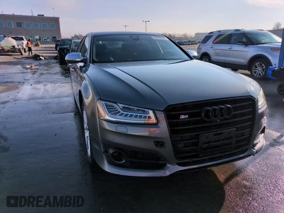 2015 Audi S8 с VIN WAUK2AFDXFN017156, выставлен на аукционе Copart как лот 50602605 с пробегом 100 224 миль миль и Списание • Salvage title. История ставок и продаж доступна на DreamBid. Изображение 14.