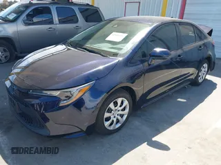 2022 Toyota Corolla LE with VIN 5YFEPMAE0NP320936, listed as a IAAI auction lot 42010316 with 21,686 mi miles. Bid and sale history available at carsss.com. Image 2.