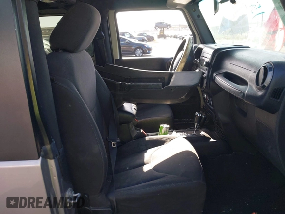 2017 Jeep Wrangler Sport with VIN 1C4GJWAG0HL621498, listed as a IAAI auction lot 42494667 with 92,284 mi miles and . Bid and sale history available at DreamBid. Image 5.