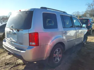 2009 Honda Pilot Touring with VIN 5FNYF48979B008851, listed as a IAAI auction lot 41252736 with 183,292 mi miles and . Bid and sale history available at carsss.com. Image 4.