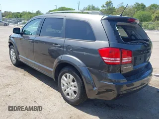 2017 Dodge Journey SE with VIN 3C4PDCAB2HT579852, listed as a IAAI auction lot 42008261 with 112,234 mi miles and . Bid and sale history available at DreamBid. Image 3.