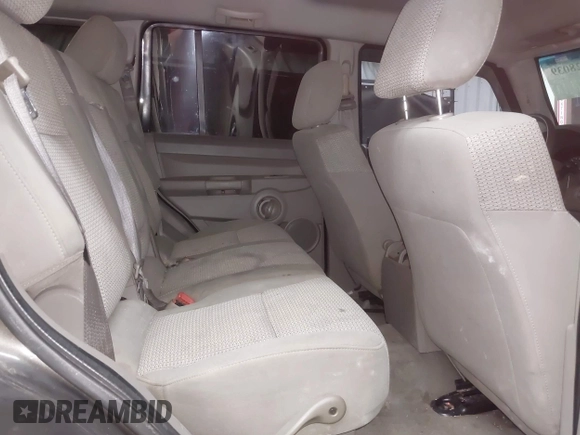 2006 Jeep Commander with VIN 1J8HG48KX6C263348, listed as a IAAI auction lot 42128039 with 208,605 mi miles and . Bid and sale history available at DreamBid. Image 8.