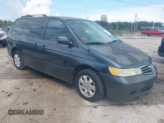 2004 Honda Odyssey EX-L with VIN 5FNRL18014B013288, listed as a IAAI auction lot 42709217 with 167,228 mi miles and . Bid and sale history available at DreamBid. Image 1.