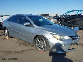 2015 Toyota Camry Hybrid LE with VIN 4T1BD1FK5FU161257, listed as a IAAI auction lot 41759927 with 116,853 mi miles. Bid and sale history available at carsss.com. Image 1.