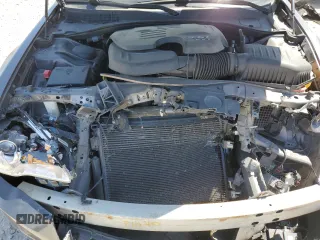 2016 Chrysler 300 C z VIN 2C3CCAEG6GH243581, wystawiony jako Copart lot #58425265 z przebiegiem 6 572 mil mil oraz Szkoda całkowita • Salvage title. Historia ofert i sprzedaży dostępna na DreamBid. Obrazek 11.