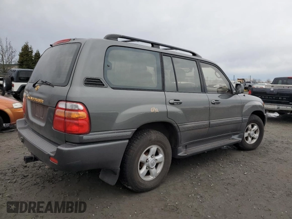 2000 Toyota Land Cruiser with VIN JT3HT05J5Y0114569, listed as a Copart auction lot 86542484 with 256,816 mi miles and Salvage Title. Bid and sale history available at carsss.com. Image 3.