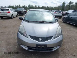 2010 Honda Fit with VIN JHMGE8H26AC001303, listed as a IAAI auction lot 42040111 with 129,949 mi miles. Bid and sale history available at carsss.com. Image 12.