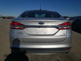 2018 Ford Fusion Hybrid SE with VIN 3FA6P0LUXJR229667, listed as a Copart auction lot 72738152 with 63,949 mi miles. Bid and sale history available at carsss.com. Image 6.