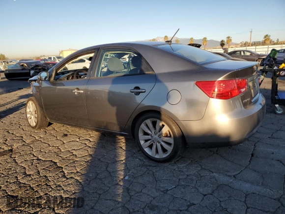 2012 Kia Forte SX with VIN KNAFW4A38C5527362, listed as a Copart auction lot 88946585 with 129,317 mi miles and Salvage Title. Bid and sale history available at carsss.com. Image 2.