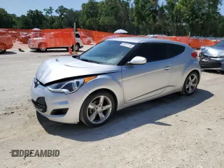 2015 Hyundai Veloster z VIN KMHTC6AD5FU227190, wystawiony jako Copart lot #57411115 z przebiegiem 95 070 mil mil oraz Szkoda całkowita • Salvage title. Historia ofert i sprzedaży dostępna na DreamBid. Obrazek 1.