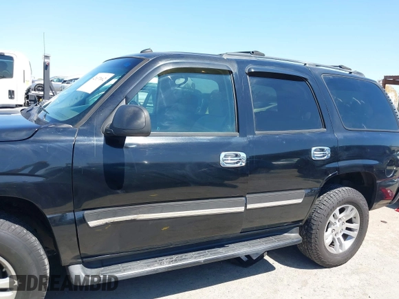 2005 Chevrolet Tahoe LS with VIN 1GNEC13V85R268525, listed as a IAAI auction lot 42637662 with 186,989 mi miles and . Bid and sale history available at DreamBid. Image 14.