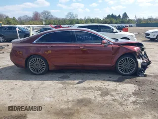 2015 Lincoln MKZ with VIN 3LN6L2JK1FR620860, listed as a IAAI auction lot 42017527 with 115,507 mi miles and . Bid and sale history available at DreamBid. Image 13.