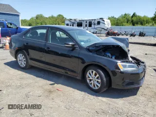 2011 Volkswagen Jetta SE with VIN 3VWDZ7AJ0BM367744, listed as a Copart auction lot 58503225 with 84,031 mi miles and Clean title. Bid and sale history available at DreamBid. Image 4.