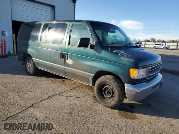 1999 Ford Econoline Passenger XL with VIN 1FMRE1126XHB41841, listed as a Copart auction lot 51338135 with 161,416 mi miles and Clean title. Bid and sale history available at DreamBid. Image 4.