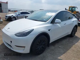 2023 Tesla Model Y Long Range with VIN 7SAYGAEEXPF776370, listed as a IAAI auction lot 42127512 with 27,120 mi miles and . Bid and sale history available at DreamBid. Image 24.