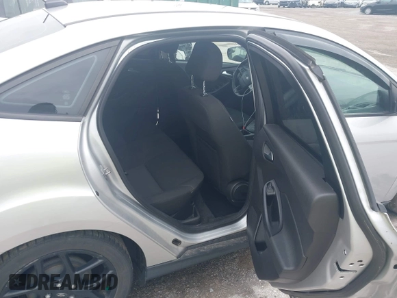 2015 Ford Focus SE with VIN 1FADP3F29FL258781, listed as a IAAI auction lot 41963223 with 121,286 mi miles and . Bid and sale history available at DreamBid. Image 8.