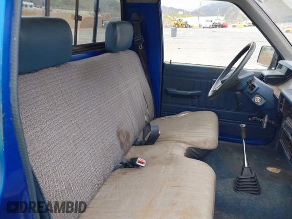 1990 Mitsubishi Mighty Max with VIN JA7FL24W8LP030657, listed as a IAAI auction lot 42014231 with 376,787 mi miles and . Bid and sale history available at DreamBid. Image 8.