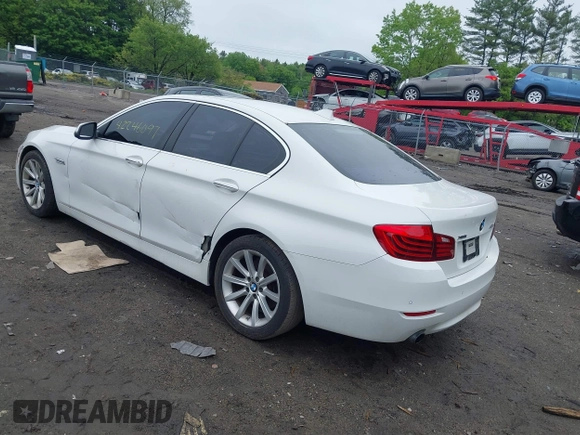2014 BMW 5 Series 535i xDrive with VIN WBA5B3C57ED538801, listed as a IAAI auction lot 42246097 with 170,219 mi miles and . Bid and sale history available at DreamBid. Image 3.