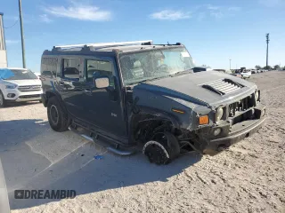 2005 Hummer H2 SUV with VIN 5GRGN23U25H115698, listed as a Copart auction lot 82569874 with 143,367 mi miles and Salvage Title. Bid and sale history available at carsss.com. Image 4.