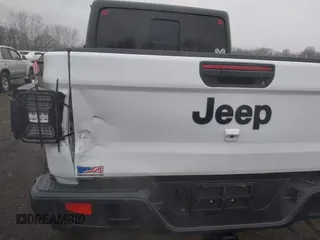 2020 Jeep Gladiator Sport S z VIN 1C6HJTAG0LL129461, wystawiony jako IAAI lot #41464713 z przebiegiem 66 625 mil mil oraz . Historia ofert i sprzedaży dostępna na DreamBid. Obrazek 17.