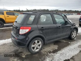 2012 Suzuki SX4 Crossover with VIN JS2YB5A30C6306884, listed as a Copart auction lot 86396074 with 91,557 mi miles and Salvage Title. Bid and sale history available at carsss.com. Image 3.
